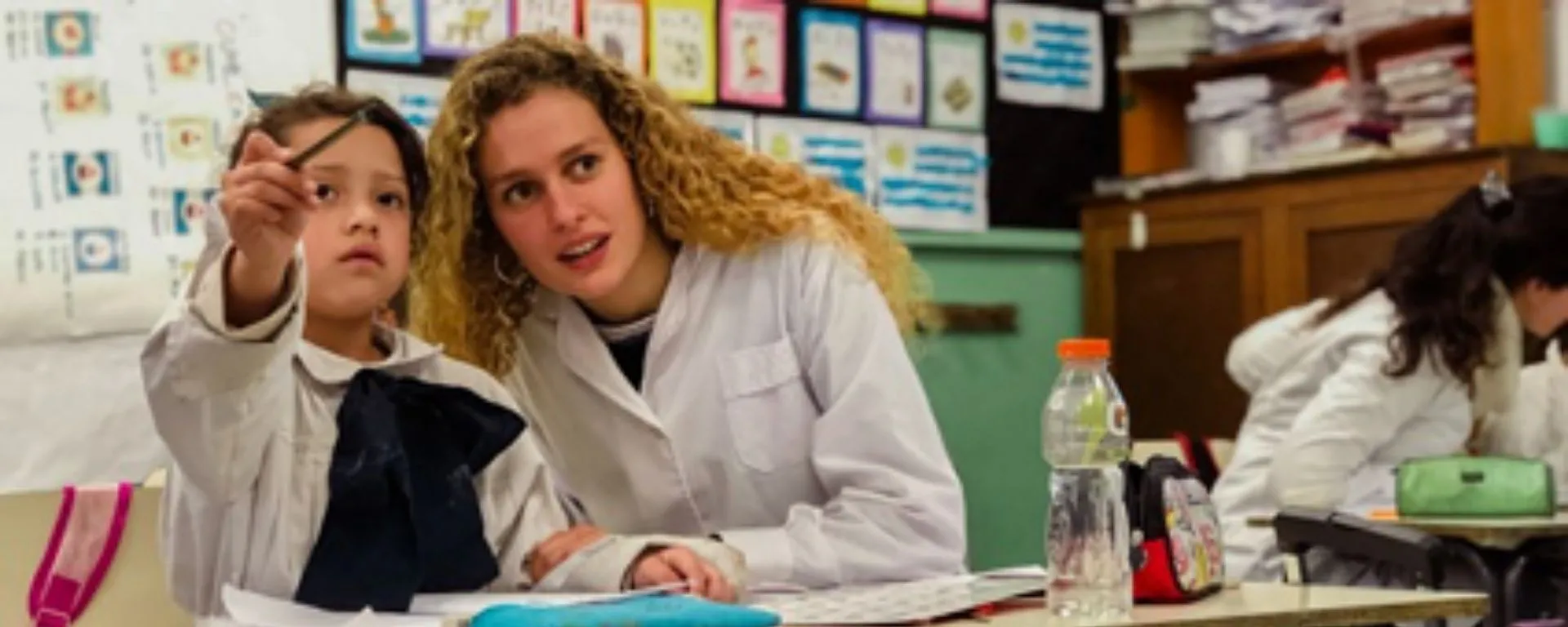 Maestra y alumno Maestra y alumno